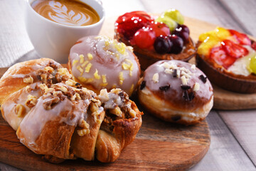 Composition with confectionery products and cup of coffee