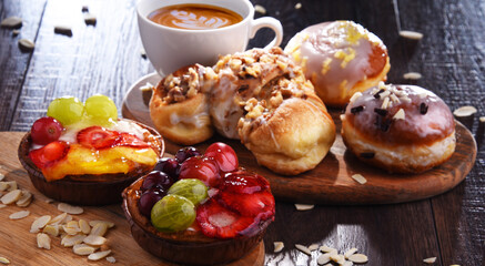 Composition with confectionery products and cup of coffee