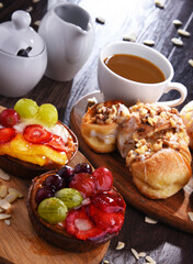 Composition with confectionery products and cup of coffee