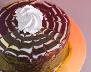 Close up of a cake with dressing on the top