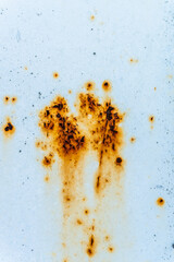 Rusty painted metal. Texture of rusty iron wall. Cracked paint on an old metallic surface. Cracked and flaky paint, abstract rusty metal texture, rusty metal background. Metal corrosion