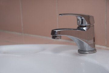 Water faucet in the bathroom