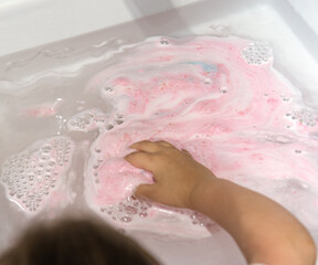 Fototapeta premium Hygiene and care, children wash their hands in the sink.