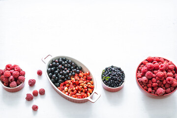 Composition with a variety of fresh berries and fruits