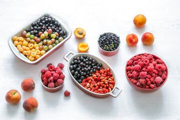 Composition with a variety of fresh berries and fruits