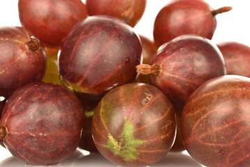 Ripe juicy organic agrus, close-up, isolated on white.
