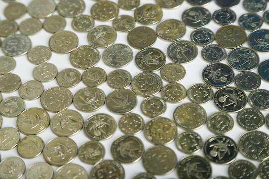 Currencies and money exchange trading concepts. Qatari  Coins ,Qatari Currency roll 