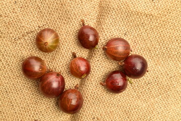 Ripe organic agrus, close-up, on a jute fabric.