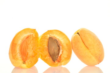Ripe organic yellow apricot, close-up, isolated on white.