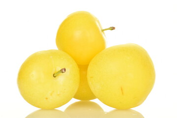 Ripe yellow plum, close-up, isolated on white.