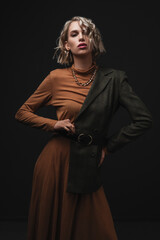 Beauty vogue style fashion model. Trendy clothes and jewelry. Glamour Girl. Professional make up. High Fashion. Photo of beautiful young woman.