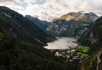 Geiranger fjord seen from the hillside on summer day with one cruise ship in port, Norway