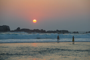 Sunset at the surf boundary. Hikkaduva, Sri Lanka