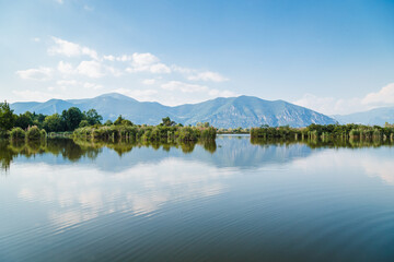 Torbiere del Sebino nature reserve in the province of Brescia on a sunny day with clouds