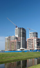 Fototapeta na wymiar Housing construction in St. Petersburg. Construction site. New buildings.