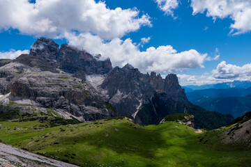 Fototapeta premium Amazing rocky mountains covered with clouds, Tre Cime di Lavaredo park, Dolomites, Italy