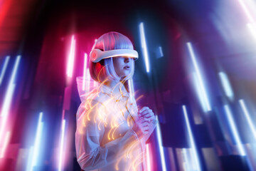 Beautiful woman with purple hair in futuristic costume over neon light background. Girl in glasses of virtual reality. Augmented reality game, future technology, AI concept. VR.