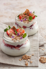 Homemade yogurt with strawberries and granola.Healthy Breakfast