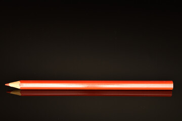 Stationery, close-up, isolated on black background.