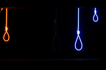 Neon light hangman's nooses, three lights on and one light off