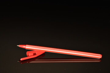 Stationery, close-up, isolated on black background.