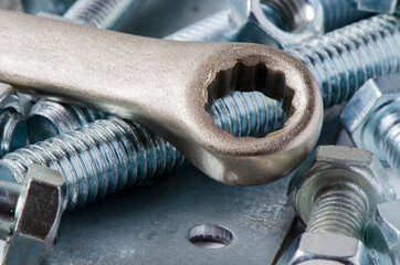 Metal bolts and nuts. Tools for working and fixing. Macrophotography.