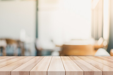 Fototapeta na wymiar Empty wooden top table with blur coffee shop background