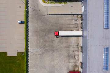 Aerial view of the distribution center, drone photography of the industrial logistic zone.