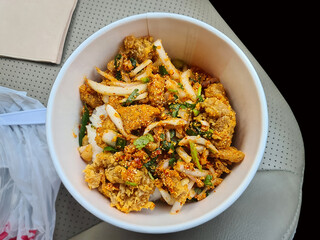 Close-up Crispy Fried Chicken with Steamed Rice in a Bowl