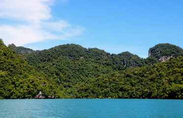 Fototapeta na wymiar landscape view of small Island in sea of with blue sky and water at langkawi (Malaysia)