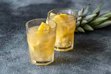 Two glasses of pineapple juice