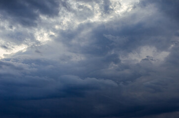 Fototapeta premium Dark blue sky with clouds