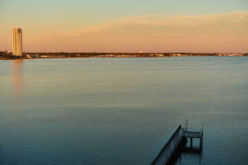 Obraz premium View of Clear Lake, Texas with orange sunset