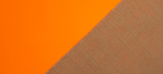 panoramic Natural linen texture, strong orange background top view.