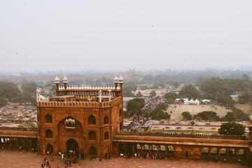 View from jama masjid in delhi. Peope in market buying things. Top view of market