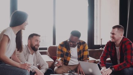 Group of five creative worker brainstorm in office