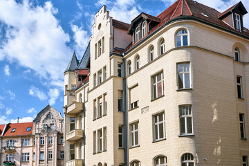 Fototapeta na wymiar A street with historic, Art Nouveau tenement houses
