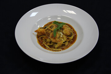  Seafood pasta on a white plate