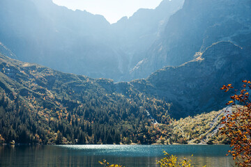View of green nature, rocky mountains and Morskie oko lake © WellStock