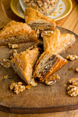 Baklava. A classic traditional rich and sweet mediterranean, Greek or Turkish, dessert pastry made of layers of filo filled with chopped nuts and sweetened and held together with syrup or honey.
