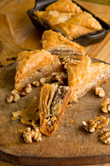 Baklava. A classic traditional rich and sweet mediterranean, Greek or Turkish, dessert pastry made of layers of filo filled with chopped nuts and sweetened and held together with syrup or honey.