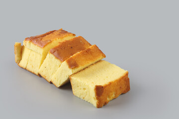 Home made  fresh sponge sliced cakes on wooden tray