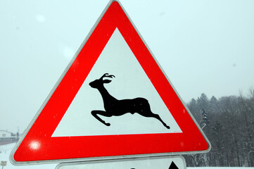 attention wildlife crossing traffic sign