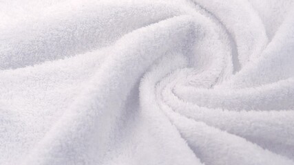Towel texture closeup. Soft white cotton towel backdrop, fabric background. Terry cloth bath or beach towels. Macro. 4K UHD video, slow motion