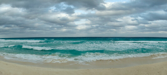 Paradise. Dream seascape. Panorama view of the turquoise color water sea, ocean waves and white sand. 