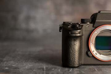 Mirrorless camera sensor on a dark background. Technology concept