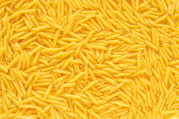 Penne pasta. Food background. Top view.
