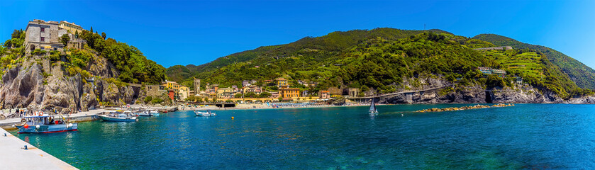 A panorama view of the harbour and old Monterosso, Italy in the summertime