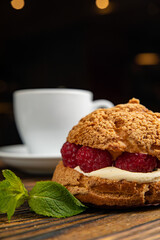 Fragrant French pastries, dessert. On a brown wooden table.
