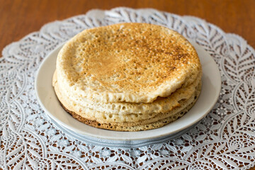 Oatmeal pancakes on a plate on a table